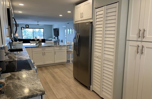 Capri Isle Condo | Beautifully renovated waterfront owner's unit, BOAT LIFT AVAILABLE for add fee