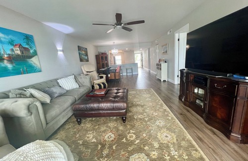 Capri Isle Apartment | Beautifully renovated waterfront owners unit!