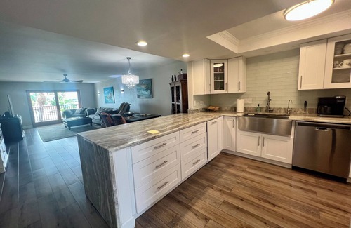 Capri Isle Apartment | Beautifully renovated waterfront owners unit!