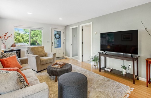 University Place House | Beautifully updated home with enclosed yard, deck, WiFi, & W/D - near everything