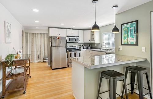 University Place House | Beautifully updated home with enclosed yard, deck, WiFi, & W/D - near everything