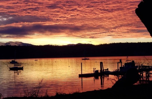 Marrowstone Cabin | Bed and a twin bed, bedroom individual, entrance and exit to private beach