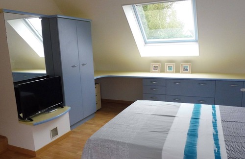Langueux House | bedroom with separate entrance, private shower room and wc, MW and refrigerator