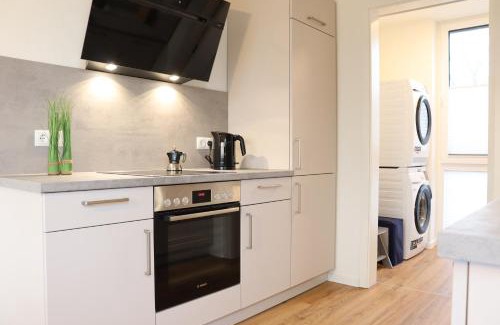 Marienleuchte Apartment | BeltBlick 19 – Exklusive Ferienwohnung mit Garten und Meerblick