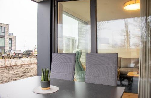 Marienleuchte Apartment | BeltBlick 19 – Exklusive Ferienwohnung mit Garten und Meerblick