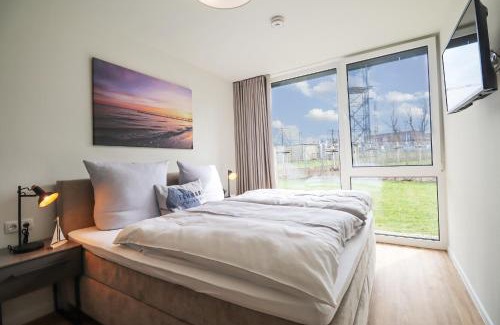 Fehmarn Apartment | BeltBlick 8 - Moderne Ferienwohnung mit unverbauten Meerblick & Sauna!