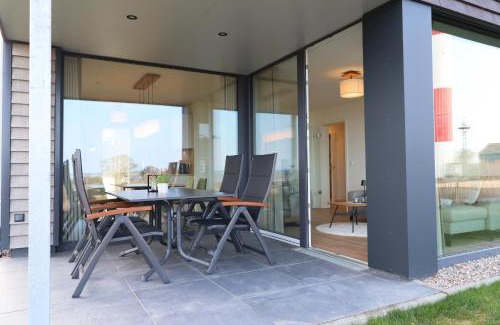 Fehmarn Apartment | BeltBlick 8 - Moderne Ferienwohnung mit unverbauten Meerblick & Sauna!