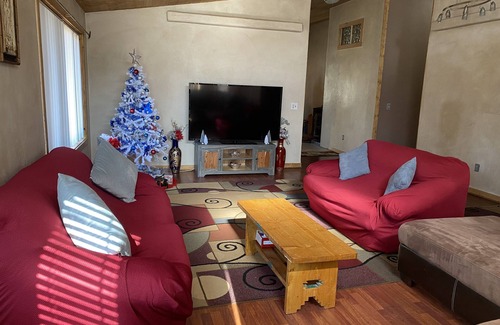 Questa House | Big family home on the river