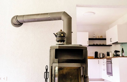 Darstein House | birds-nest holiday home palatian forest balcony wood stove