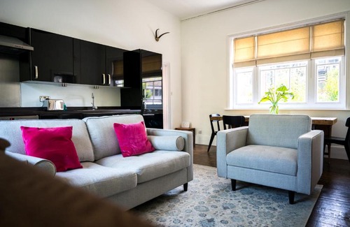 Worthing Apartment | Birdsong & Pine: parking & garden