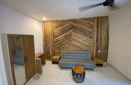 Downtown Holbox Hotel | Black flamingo