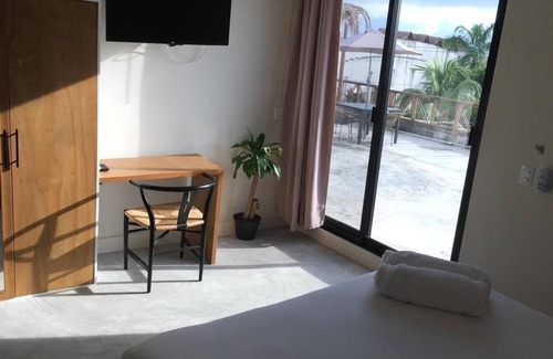 Downtown Holbox Hotel | Black flamingo