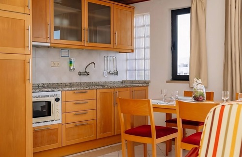 Areias de Sao Joao Hotel | Blissful Getaway! Full Kitchen and Balcony, Swimming Pool, Near Oura Beach!