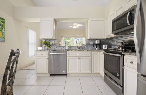 Sabal Harbour House | ⚓Blue Heron House! Cozy home w/heated pool and pool toys! Water view out back!⚓🌅