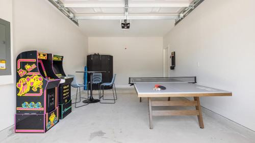Vilano Beach House | Blue Hour Playfully Designed Beach Home w Hot Tub Fire Pit Game Room