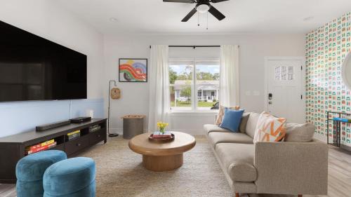 Vilano Beach House | Blue Hour Playfully Designed Beach Home w Hot Tub Fire Pit Game Room