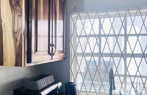Molynes Gardens Condo | Blue Laventura cozy condo with WiFi and AC in enchanting Kingston