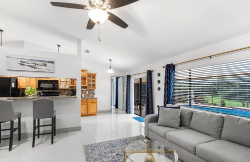 Brandon House | Blue Serenity Retreat - Come relax by the heated pool and jacuzzi!
