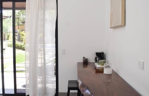 Junquillal Apartment | Blue Window
