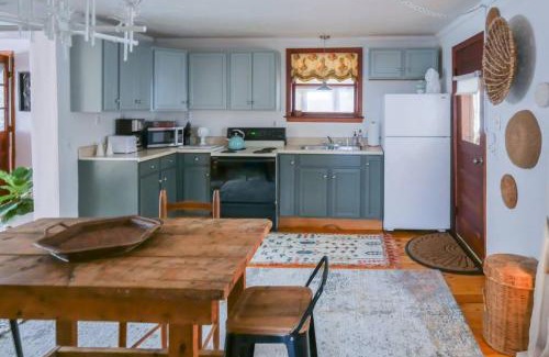 Winooski Falls Mill District Apartment | Bohemian Bungalow with Hot Tub