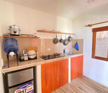 Catangnan House | Bonak homestay peaceful Beachfront Escape with Kitchen and AC