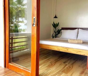 Catangnan House | Bonak homestay peaceful Beachfront Escape with Kitchen and AC
