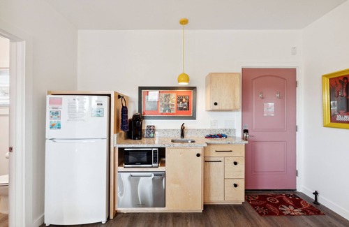 Folly Beach Hotel | Boutique Hotel Folly Room 9: King Studio with a deck - sunset views over Folly River