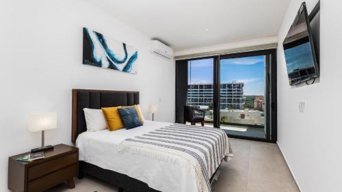Flamingos Apartment | Brand New Condo Aria Ocean 501 by Kivoya