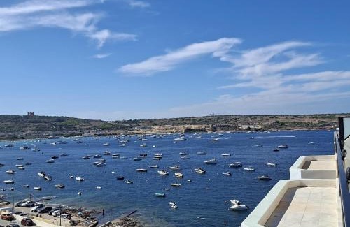Għadira Apartment | Bright Coastal Penthouse with Huge Terrace Overlooking the Sea- Ghadira Mellieha
