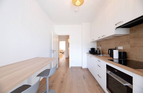 Gare Apartment | Bright & Stylish 2BR Apt in City Center