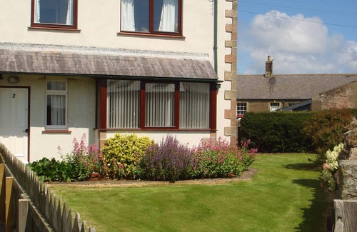 Belford Cottage | Bright, sunny cottage with garden to three sides & overlooking fields