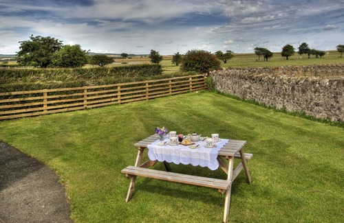 Belford Cottage | Bright, sunny cottage with garden to three sides & overlooking fields