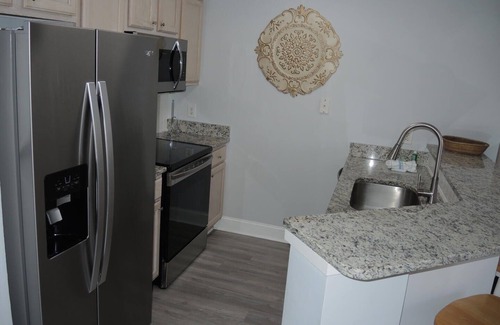 Calabash Condo | Brunswick Plantation Resort and Golf Condo 307M with Outdoor Pool by RedAwning