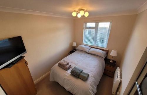 Mumbles Apartment | Bungalow a few minutes from the sea.