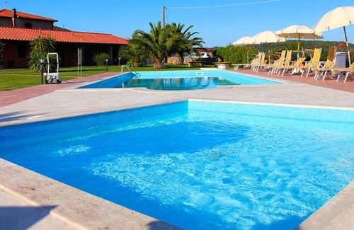 Puntone House | Bungalow with pool in a park-like garden by the sea!