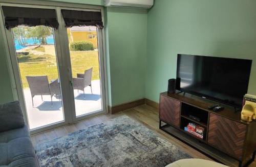 Rock Sound Apartment | By the Bay - Brand New Apartment, Steps to the Sea, Walk to Town apts