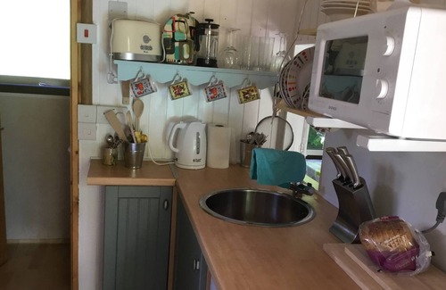 Cenarth House | Caban Bach - The Little Cabin. Cosy cabin with huge sunny deck.