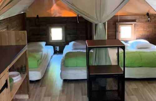 Saint-Amand-Montrond Ski Chalet | Camping Canal de Berry *** - Classic Amazon Lodge on stilts 3 rooms 4 people Without sanitary facilities