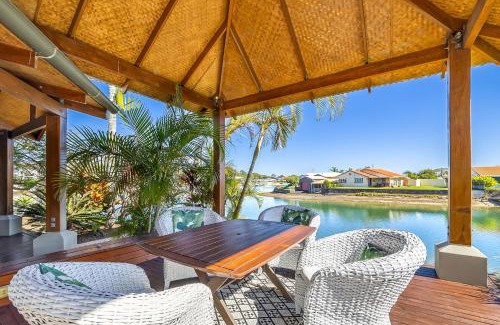 Maroochydore House | Canal Front family Home with extensive outdoor covered areas and pool