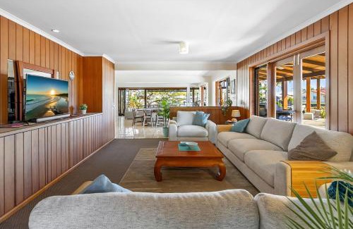 Maroochydore House | Canal Front family Home with extensive outdoor covered areas and pool