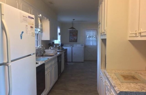 North Shores House | Canal-Front Retreat: 5BR Home w/Private Dock, Porch, Beach & Pool Access!