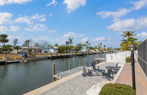 Whitney Beach House | Canalfront Bradenton home with Dock & Heated Screened In Pool