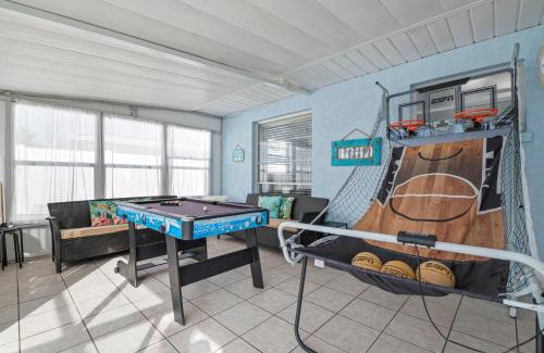 Whitney Beach House | Canalfront Bradenton home with Dock & Heated Screened In Pool