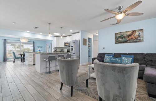 Whitney Beach House | Canalfront Bradenton home with Dock & Heated Screened In Pool