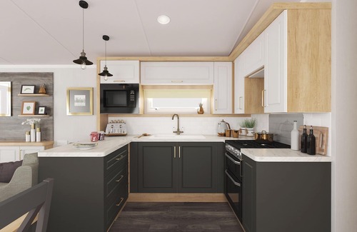 Waren Mill House | Caravan with one double and one twin.
