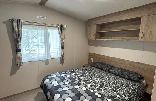Newquay Cabin | Caravansleeps4-beachfront-garden-patio