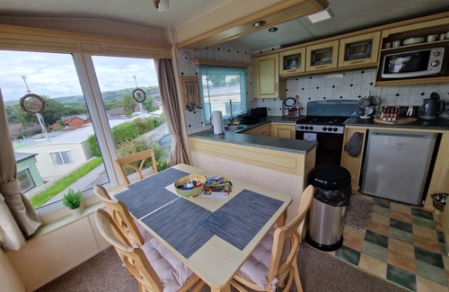 Penparcau Ski Chalet | CaravanSleeps6-Parking-Pool-Mountain-PetsOk