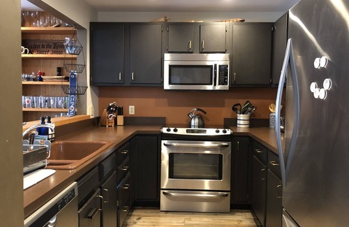 Carrabassett Valley House | Carrabassett Wheelhouse ~ Mountain Bike Inspired River-front Home