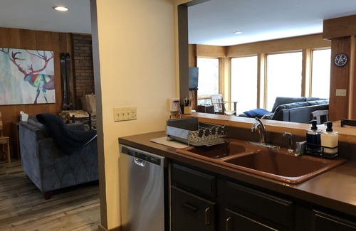 Carrabassett Valley House | Carrabassett Wheelhouse ~ Mountain Bike Inspired River-front Home