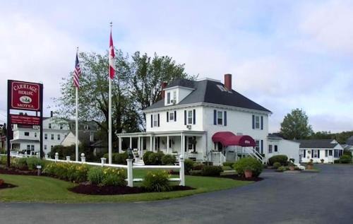 Wells Hotel | Carriage House Motel Cottages & Suites